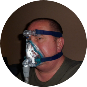 Man With CPAP Mask